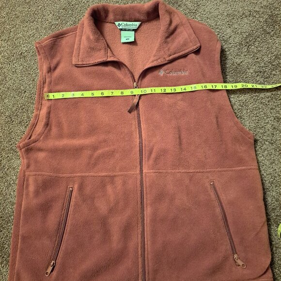 Columbia fleece vest in a burnt orange or rust color. - Picture 4 of 7
